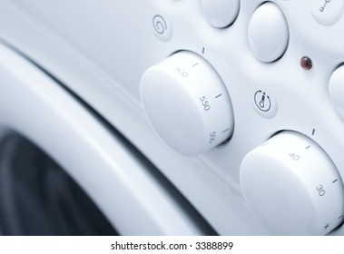 White washing machine with button close up
