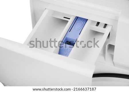 white washing machine compartment close up
