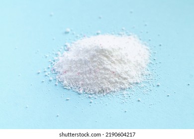 White Washing Powder Pile On Light Blue Background