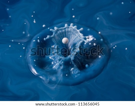 White water droplet on the top of the blue liquid splash