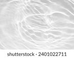 White water with ripples on the surface. Defocus blurred transparent white colored clear calm water surface texture with splashes and bubbles.