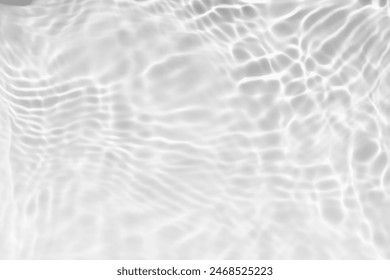 White water with ripples on the surface. Defocus blurred transparent white colored clear calm water surface texture with splashes and bubbles. Water waves with shining pattern texture background. - Powered by Shutterstock