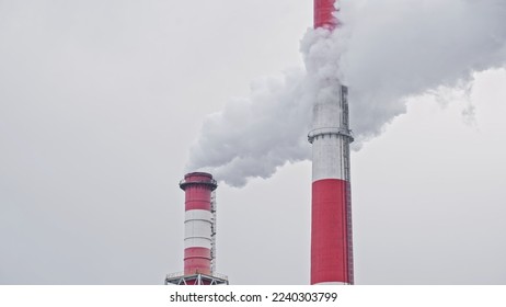 White Water Vapor Smoke Coming Out of Cogeneration Power Plant Cooling Tower Chimneys