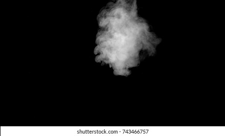 White Water Vapour On A Black Background. Close-up Shot