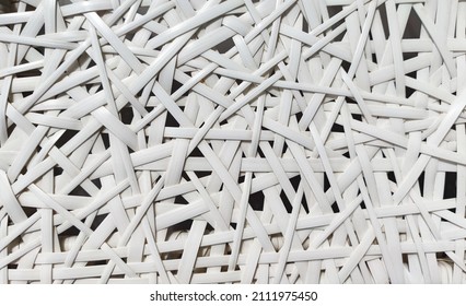 White weaving pattern background in macro style. Weaving texture classic design background. Bamboo weaving chair texture.