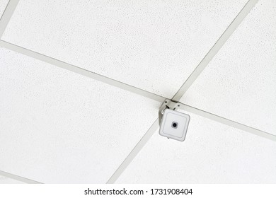 White webcam on the ceiling