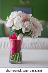 White Wedding Bouquet In Vase In Bridal Suite