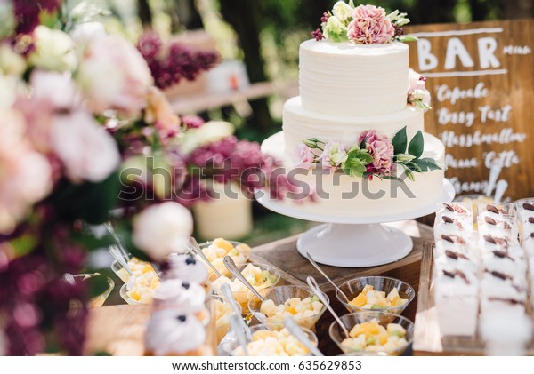 White Wedding Cake Decorated By Flowers Stock Photo Edit Now