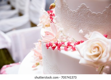 White Wedding Cake With Flower