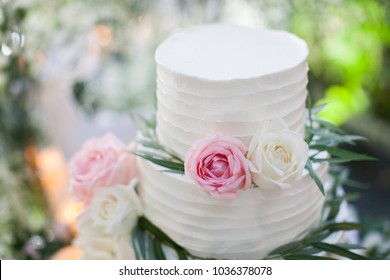 White Wedding Cake With Flowers 