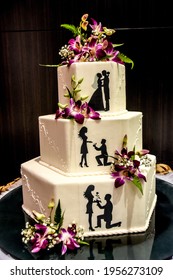 White Wedding Cakes That Are Built Tall. Nice Design And Unique With Lots Of Attention To Detail.