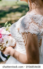 white wedding dress with lace and pearls