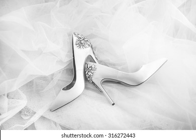 white wedding shoes with accessories