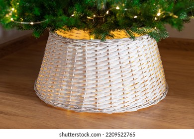 White Wicker Basket For Christmas Tree. Christmas Tree Base Cover. Closeup
