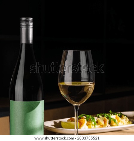 White wine and appetizers complementing a fine dining and gastronomy experience