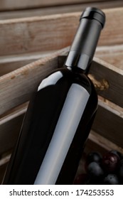 White Wine Bottle Close Up In Wooden Crate