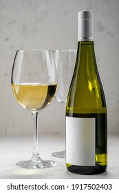 White Wine Bottle With Empty Label And Glasses, Mockup Logo Design