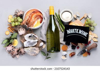 White Wine Bottle On Gray Background. Seafood And Appetizers. Top View, Flat Lay