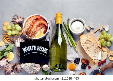 White Wine Bottle On Gray Background. Seafood And Appetizers. Top View, Flat Lay, Copy Space