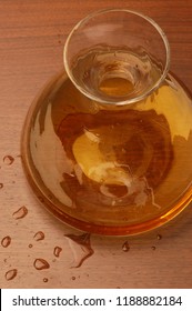 White Wine In A Glass Carafe, Close Up, Top View, Drops On Table