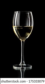 White Wine In A Glass On Black Background