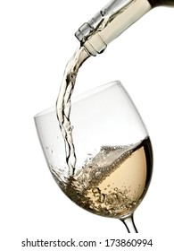 White Wine Pouring In A Glass From A Bottle