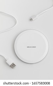 the white wireless charger in white background