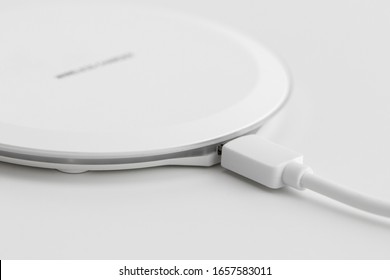 the white wireless charger in white background