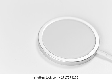 white wireless charger for phone. Isolated on white