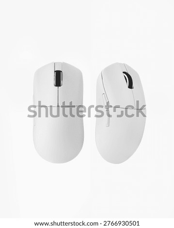 A white wireless computer mouse isolated against a white background, shown from two angles: top and side.