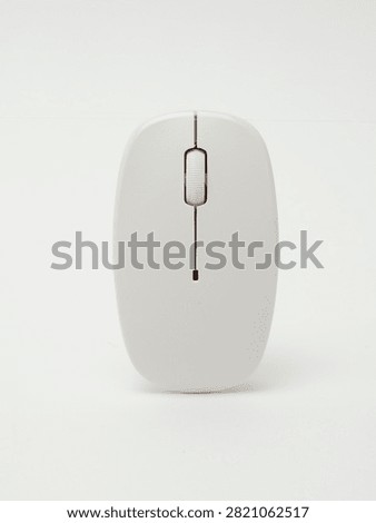 White wireless computer mouse on white background