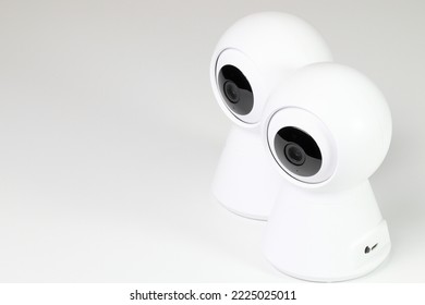 White, wireless wi-fi IP cameras, CCTV Cameras for security isolated on a white background. - Shutterstock ID 2225025011