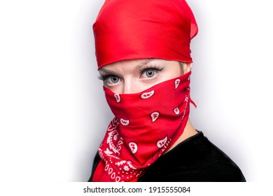 A White Woman In The Red Bandana And Face Covering Is Looking In The Camera Isolated On White