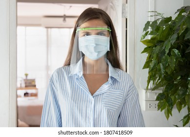 White Woman Wearing Face Mask And Face Shield Indoor