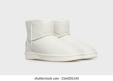 White women's fashion leather winter boots shoes isolated on white background. Pair of Female luxury footwear. Template, mock up