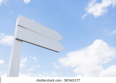 White wood blank signpost - Shutterstock ID 387601177