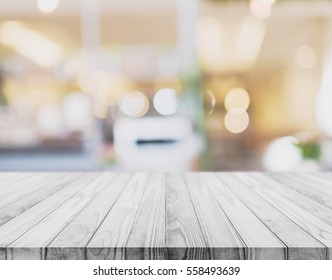 White Wood Table Top With Blurred Defocus Backgrounds