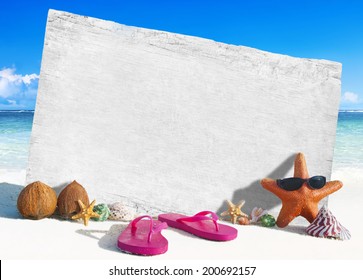 White Wooden Board With Other Objects By The Beach