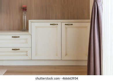 White Wooden Commode With Tv Unit Near Big Window