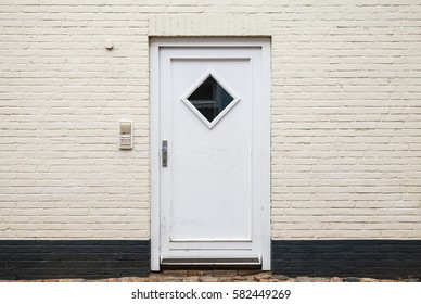 White Wooden Door In Brick Wall, European Living House Entrance
