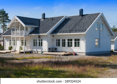 White Wooden House In Norway