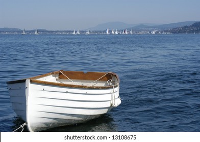 White Wooden Rowboat In Bellingham Bay