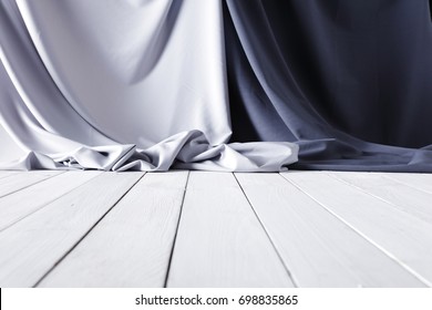 White Wooden Table And Gray Textile Background