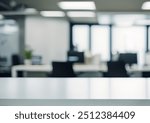 white wooden table top with blurry open space office background