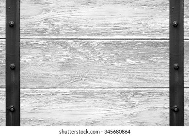 White Wooden Texture With Black Metal Bar