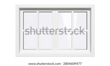 White wooden window frame with multiple glass panes and muntins