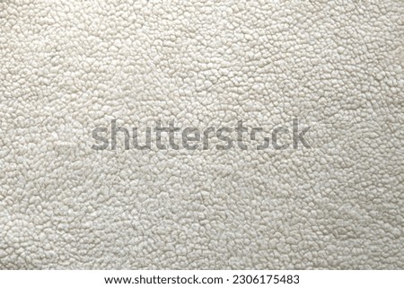 White wool texture. Abstract wool textured  backgrounds. Closeup beige wool background. 