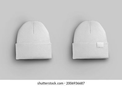 White woolen headdress mockup for design presentation, padded warm beanie with tag, label. Unisex hat template isolated on background, close up, for advertising in an online store, product promotion