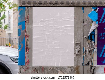 White wrinkled poster template. Glued paper mockup. Blank wheatpaste on textured wall. Empty street art sticker mock up. Clear urban glued advertising canvas. - Shutterstock ID 1702572397