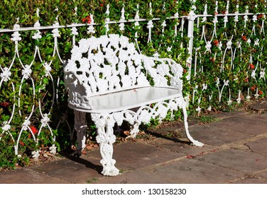 White Wrought Iron Bench In The Park